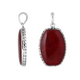 Sterling silver octagon pendant with red coral and hammered silver frame handcrafted in Bali